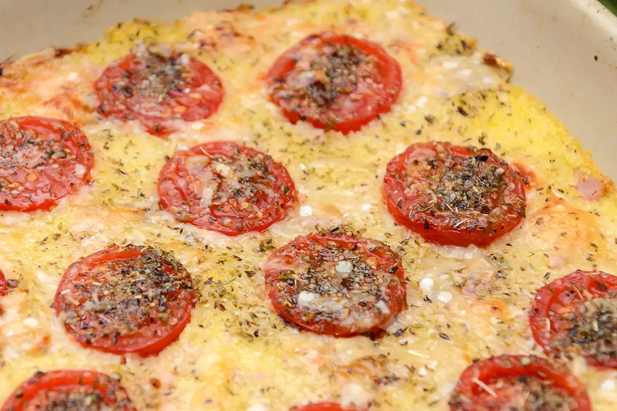 Recette de gratin de polenta aux tomates