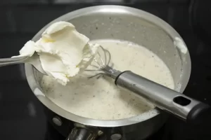 Ajouter le fromage à la béchamel